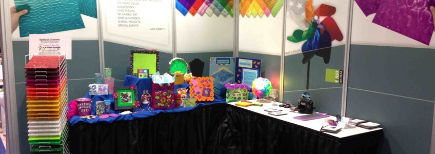 Miceli Productions Photogtraphy displayed in a Rowland Technologies trade show booth